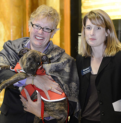 Kara Holmquist with Massachusetts State Representative Denise Andrews as she holds “Billy” a rescue/shelter dog during the Massachusetts Humane Lobby Day in 2012. 