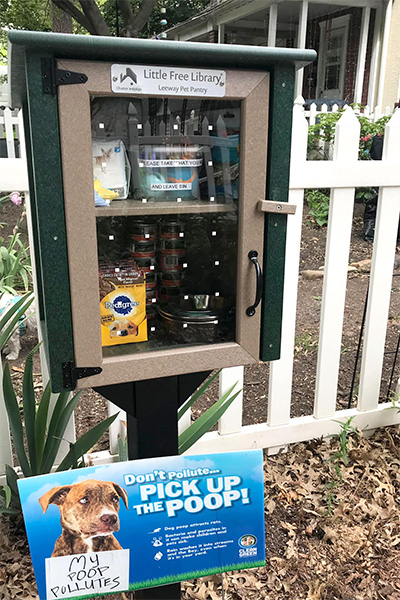 an outdoor cabinet filled with pet food
