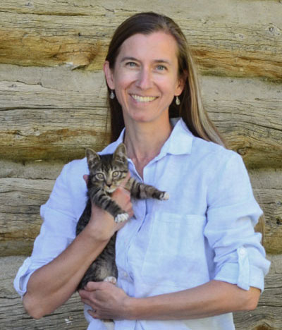 Dr. Schumacher holding a kitten