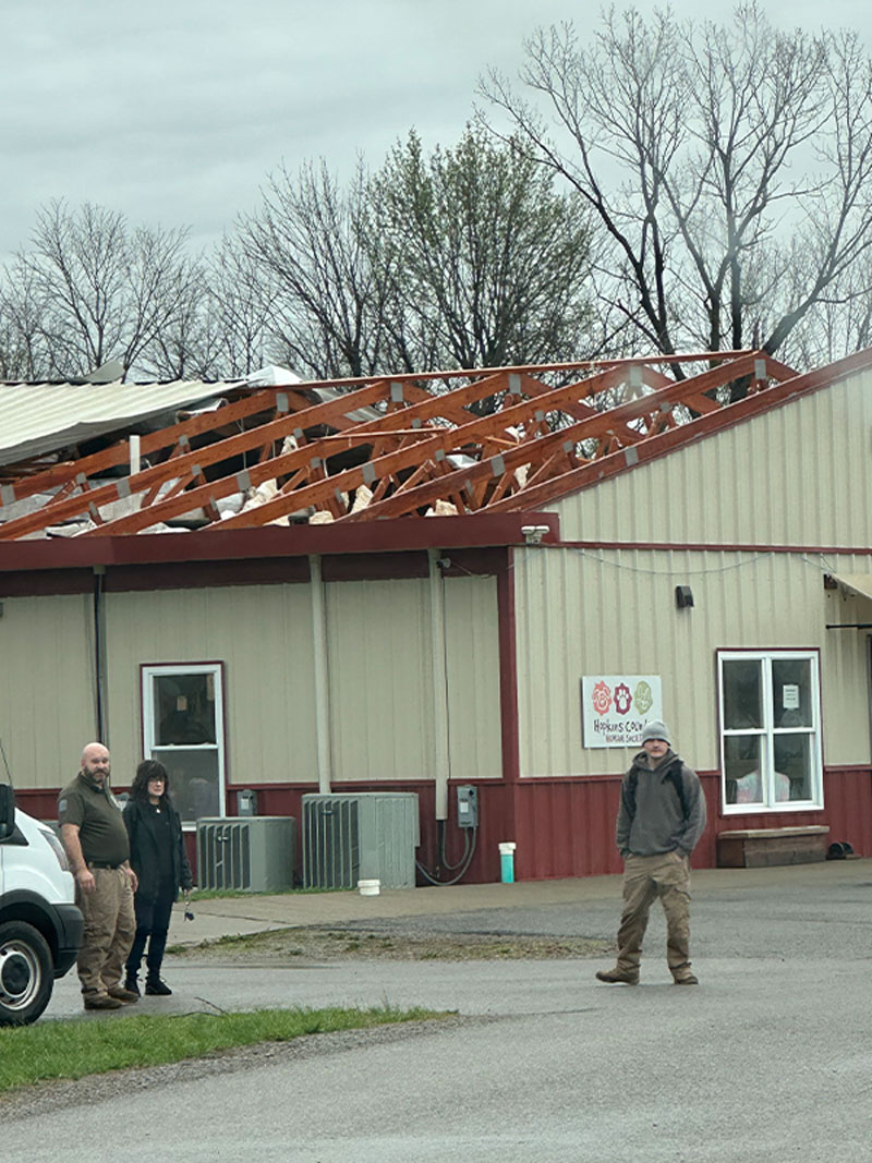 exterior shot of a tornado missing a large portion of the roof