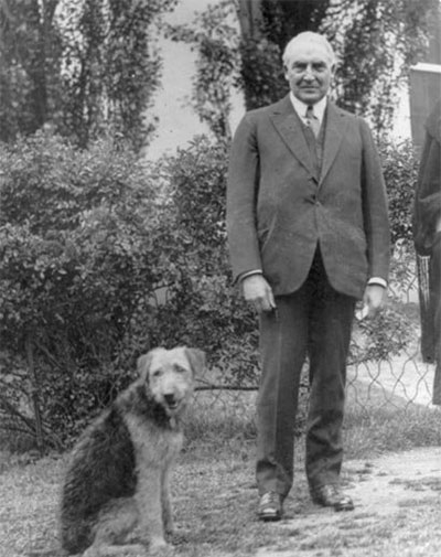 President Harding and Laddie Boy outside