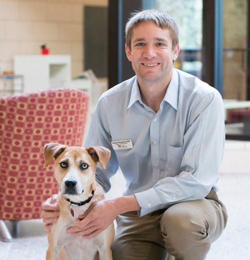Dr. Graham Brayshaw with dog