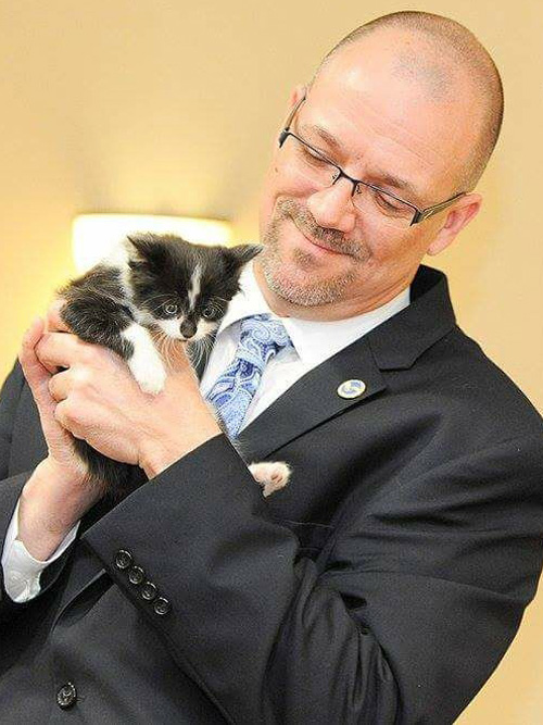 Todd Cramer with a kitten