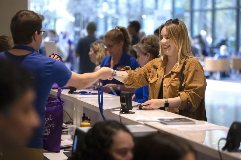 Woman at registration desk