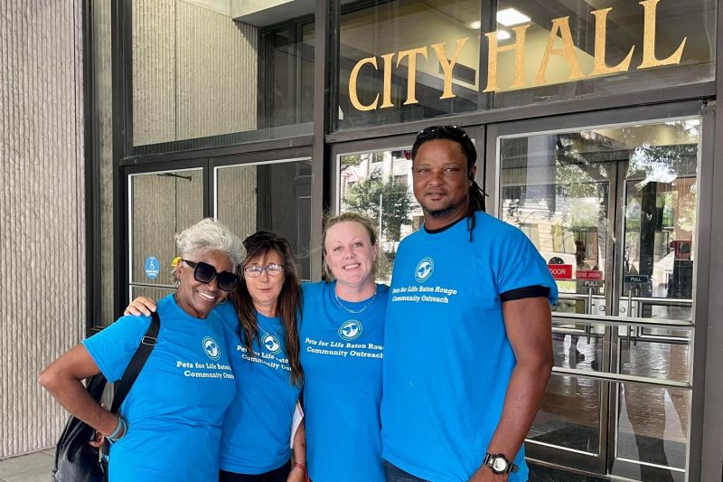 Pets for Life Baton Rouge community outreach advocates standing in front of City Hall