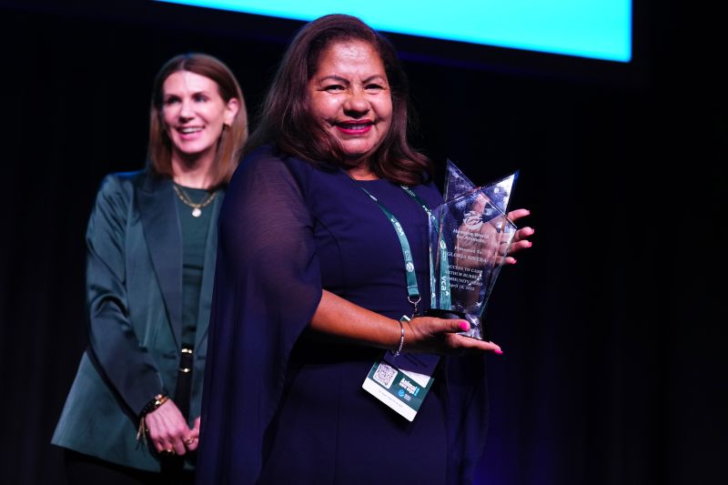Woman winning an award