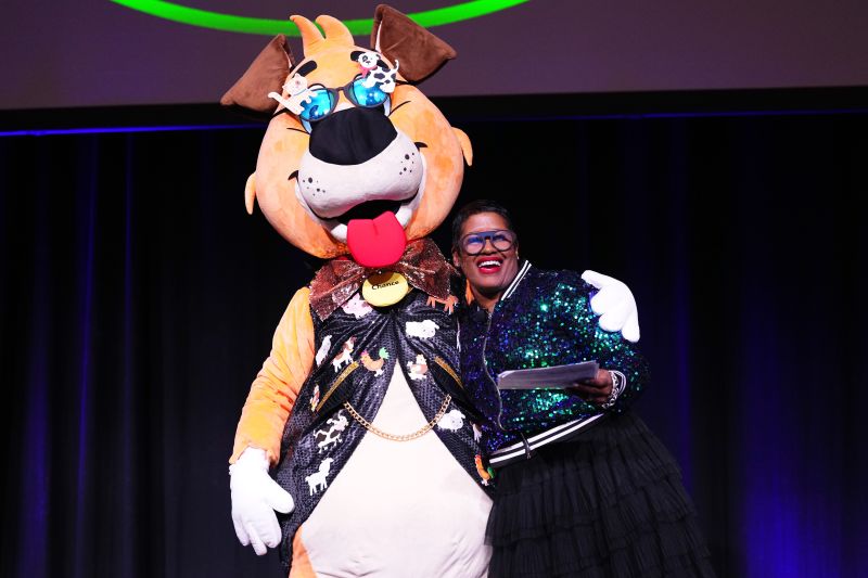 Person in a dog costume and Sherron Washington