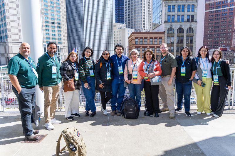 Group of Expo attendees on a terrace 
