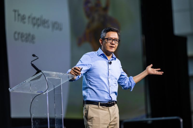 Vu Le speaking on stage