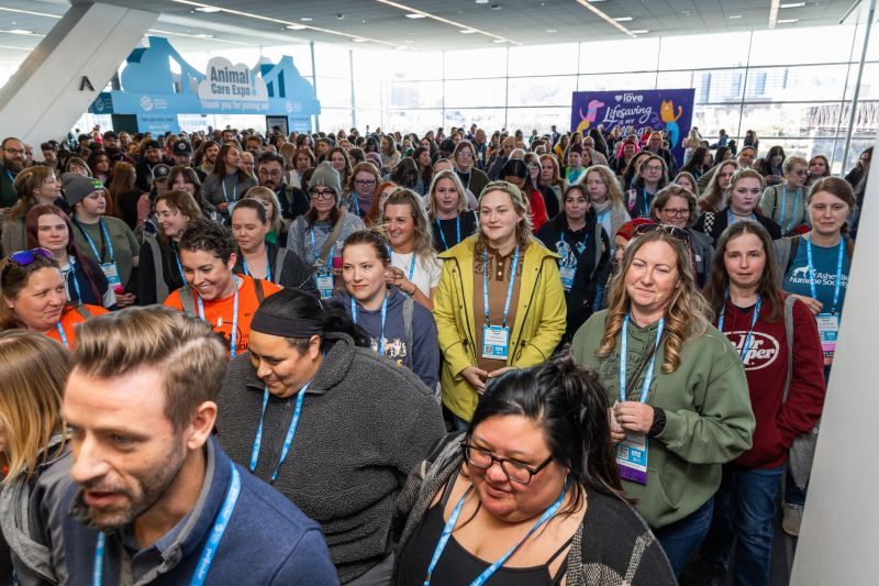 Large group of attendees outside the exhibit hall