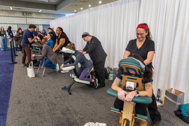 Massage therapists at the peaceful paws lounge