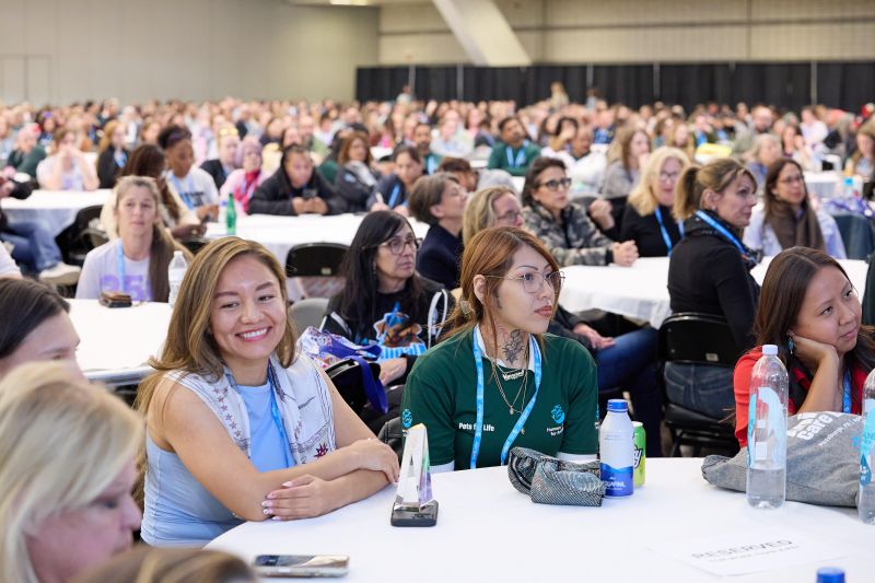 Attendees watching the main stage