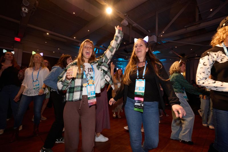 Attendees dancing