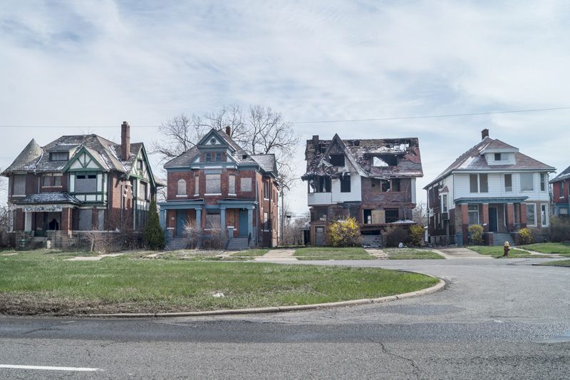 a row of dilapidated abandoned houses