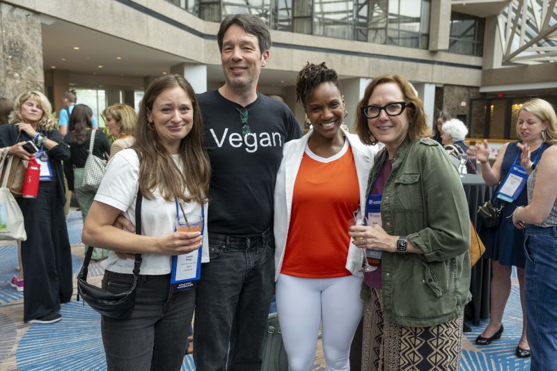 Group of attendees smiling at the camera