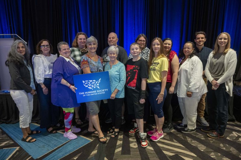 Group of attendees smiling at the camera