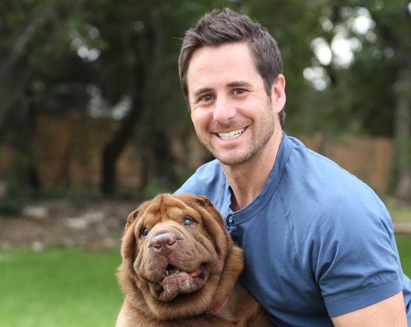 Travis Brorsen with a dog