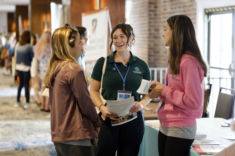 2025 Taking Action for Animals attendees chatting