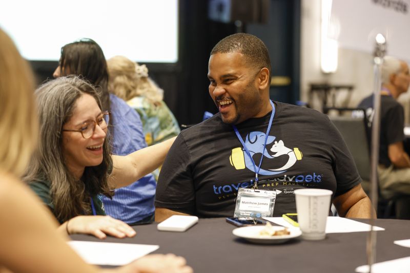 Attendees laugh and network at TAFA 2025.