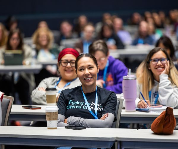 Attendees at a workshop smiling