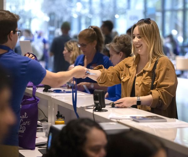 Woman at registration desk