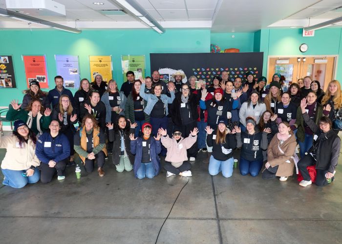 Group of volunteers waiving