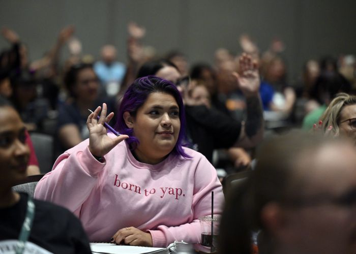 Person raising their hand