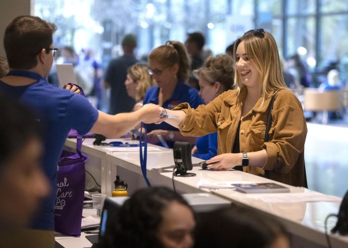 Woman at registration desk