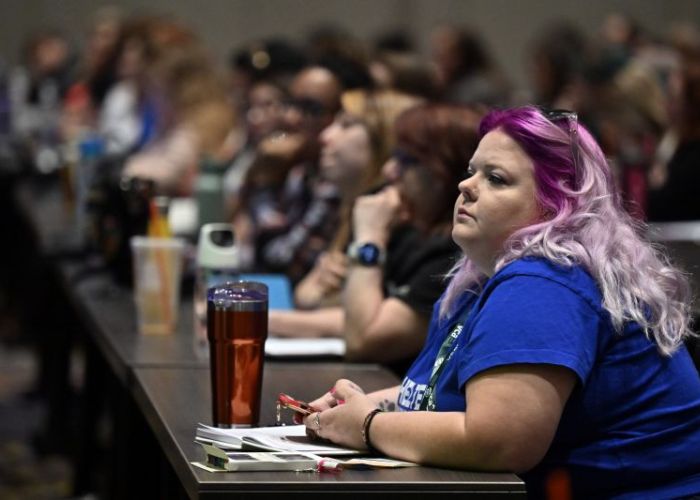 Attendees observe a workshop at Expo 2025