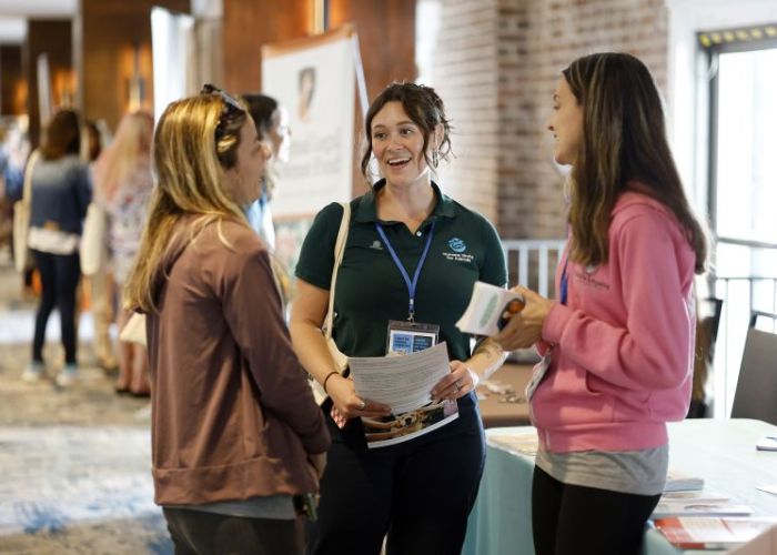 2025 Taking Action for Animals attendees chatting