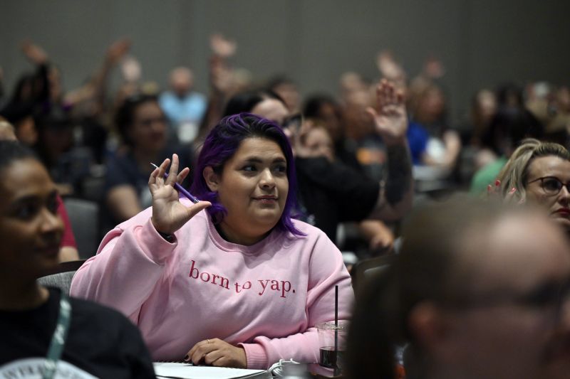 Person raising their hand